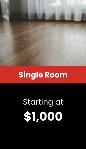 a wood floor with a red and white text