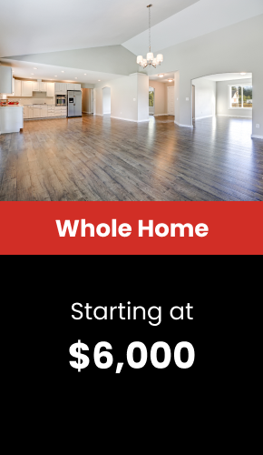 a large open floor plan with a wood floor and a large kitchen