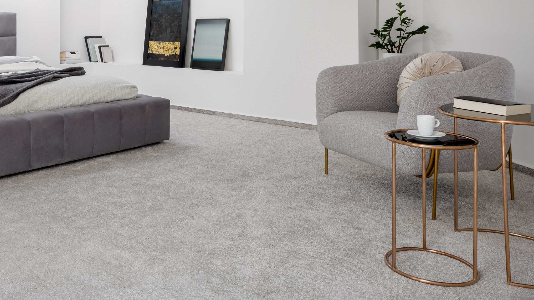 Elegant living room with plush carpet, contemporary furniture, and stylish decor.