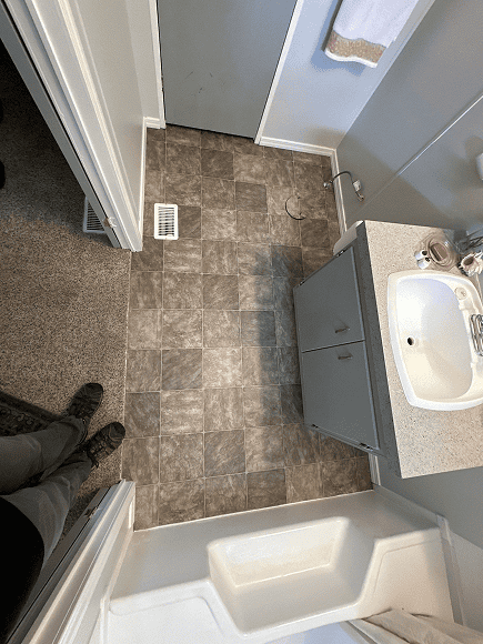 Bathroom floor with new tile installation.